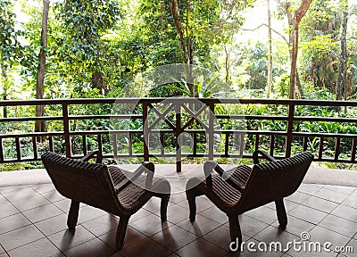 Eco tourism, resort patio with natural jungle view Stock Photo