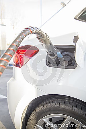 Ecological car refueling the CNG tank Stock Photo