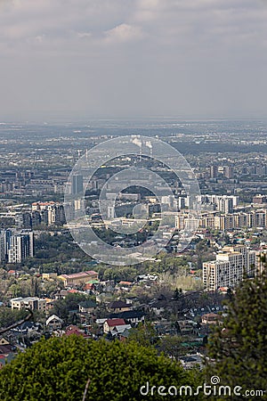 Environmental problems of large cities. Smog over the city of Almaty in Kazakhstan. Stock Photo