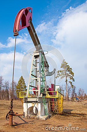 ecology, bionomics. Oil pumps. Oil industry equipment. Beam Pump Stock Photo