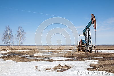 ecology, bionomics. Oil pumps. Oil industry equipment. Beam Pump Stock Photo