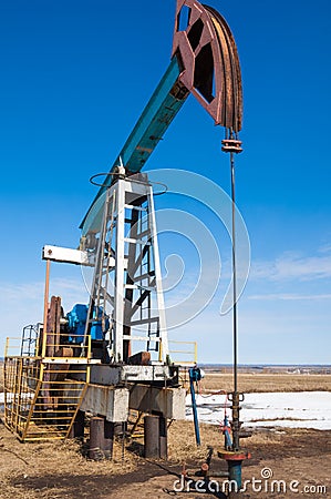 ecology, bionomics. Oil pumps. Oil industry equipment. Beam Pump Stock Photo