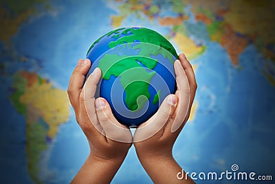 Ecology concept with earth in child hands Stock Photo