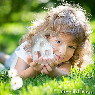 Ecology house in hands Stock Photo