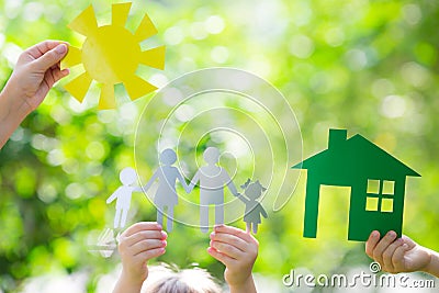 Ecology house in hands Stock Photo