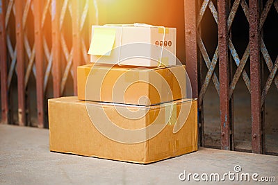 Ecommerce delivery shopping online and order delivered parcels on floor near front door steel Stock Photo