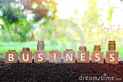 Economic and business recovery, economy bounce back, regain, rebound, pick up and comeback concept. Wooden blocks with w shape. Stock Photo