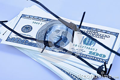 Economic warfare, sanctions and embargo busting concept. US Doll Stock Photo