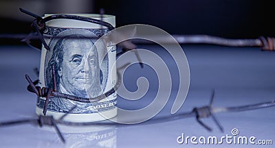 Economic warfare, sanctions and embargo busting concept. US Doll Stock Photo