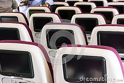 Economy class airplane interior. Stock Photo