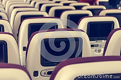 Economy class airplane interior. Stock Photo