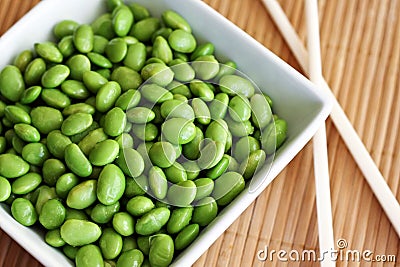 Edamame with Chopsticks Stock Photo