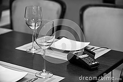 EDC machine or bankcard in reader on table in restaurant Stock Photo