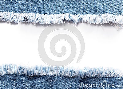 Edge frame of blue denim jeans ripped over white background. Stock Photo