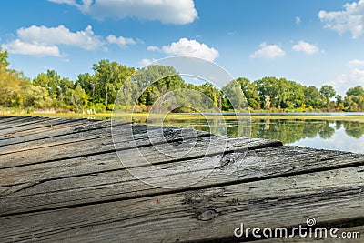 Edge of an old dock at a lake in Saginaw, Michigan Stock Photo