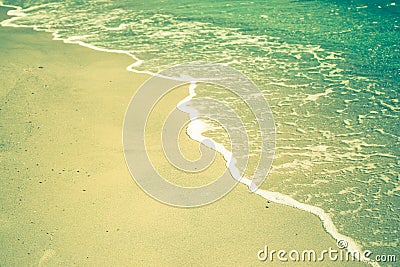 Edge of sea waves on a sandy beach Stock Photo