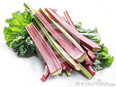 Edible rhubarb stalks on the white background Stock Photo