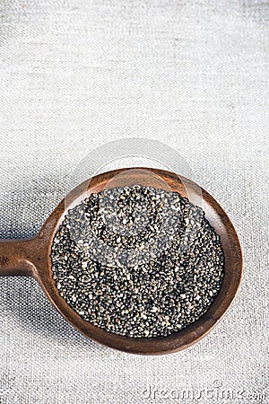 Edible seeds of chia, Salvia hispanica, a flowering plant of the mint family. A popular healthy food product Stock Photo