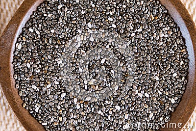 Edible seeds of chia, Salvia hispanica, a flowering plant of the mint family. A popular healthy food product Stock Photo