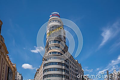 Edificio Capitol (or Carrion) Building with famous Schweppes sign at Gran Via Street - Madrid, Spain Editorial Stock Photo