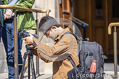 Edinburgh, Scotland, August 8th 2019. Photographer or Blogger shooting photos or video, using modern simple set of equipment Editorial Stock Photo