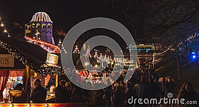 EDINBURGH, SCOTLAND DECEMBER 13, 2018: Panoramic view of illuminated Christmas fair with loads of shining decoration Editorial Stock Photo