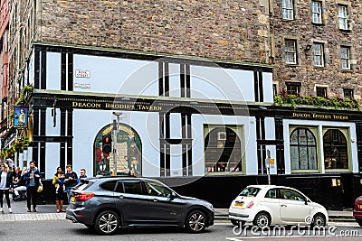 Edinburgh, Scotland, 11 June 2019: Main entry to Deacon Brodies Tavern in a cloudy rainy summer day Editorial Stock Photo