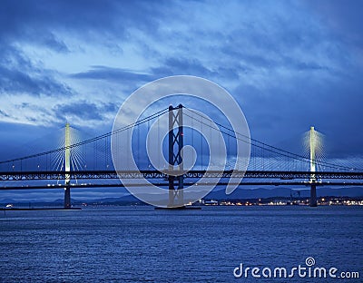 Edinburgh, Scotland - 12th January 2019: The Forth Road Bridge and Queensferry Crossing at Twilight. Editorial Stock Photo