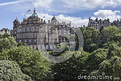 Edinburgh, Scotland, the UK - old town, blue skies and green trees. Editorial Stock Photo