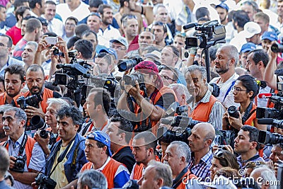 Very crowded press staff trying to view Kirkpinar wrestlers in Turkey Editorial Stock Photo