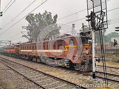 Editorial. Dated-18th April 2020, location - New Delhi. An Indian Frieght train.A forward view of outside the train door Editorial Stock Photo