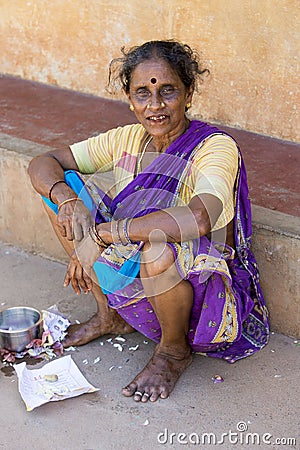 Editorial illustrative image. Poor worker woman in India Editorial Stock Photo