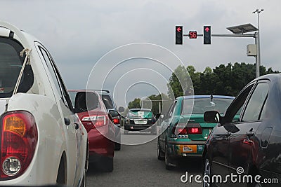 Editorial image of junction with traffic light and cars Editorial Stock Photo