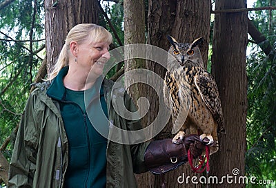 Park ranger explaining owl Editorial Stock Photo
