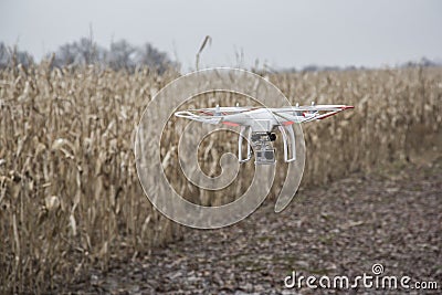 Editorial photo of a DJI Phantom drone in flight with a mounted GoPro Hero3 Black Edition Editorial Stock Photo