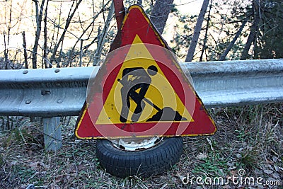 Editorial photo of a road construction site. warning signs of work in progress. cartels written in Italian. public message Editorial Stock Photo