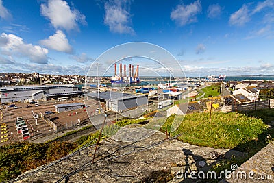 Editorial, Port of Holyhead with wind turbine installation vessel in distance, wide angle Editorial Stock Photo
