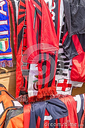 EDITORIAL scarves and clothing of Serie A football teams in antique fair Editorial Stock Photo