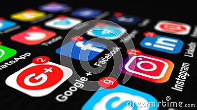 Editorial shot: icons of social media apps with numbers on notification counter on black screen smartphone. Mobile app Editorial Stock Photo