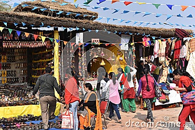 Editorial: Surajkund, Haryana, India: People checking out shops in 30th International crafts Carnival Editorial Stock Photo