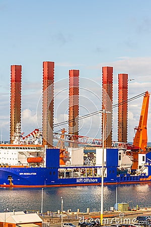 Editorial, wind turbine installation vessel WTIV specifically designed for the installation of offshore wind turbines, telephoto Editorial Stock Photo