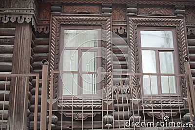 City landscape. The monument of wooden architecture of the early 20th century at 22a, Karl Marx Street. Editorial Stock Photo