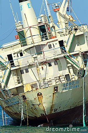 Edro III cargo ship aground near the shore of the Sea Caves Editorial Stock Photo