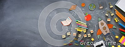 Education. Back to school concept. rocket cut from paper and painted over blackboard background. top view, flat lay Stock Photo