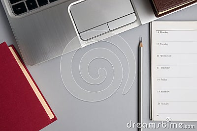 Education and business concept. Planner with books, notebook and pencil Stock Photo