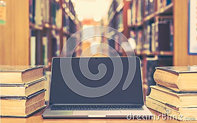 Education e-learning class and e-book digital technology concept with computer notebook screen open in school library Stock Photo