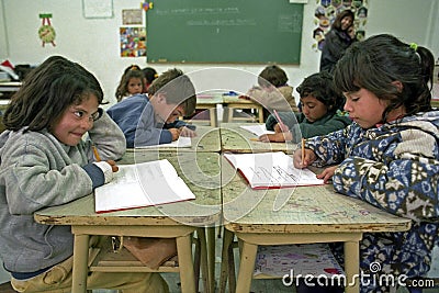 Education pupils have writing lessons in classroom Editorial Stock Photo