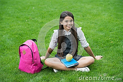 Education towards freedom. Happy child relax on green grass. Happy childhood. Back to school. Early childhood. Childhood Stock Photo