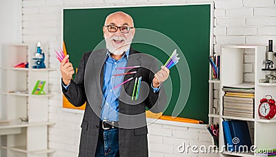 Education trends. Adaptive learning systems use data adjust learning individual scale. Senior intelligent man teacher at Stock Photo