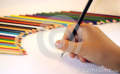 Education and writing hand color pencil Stock Photo